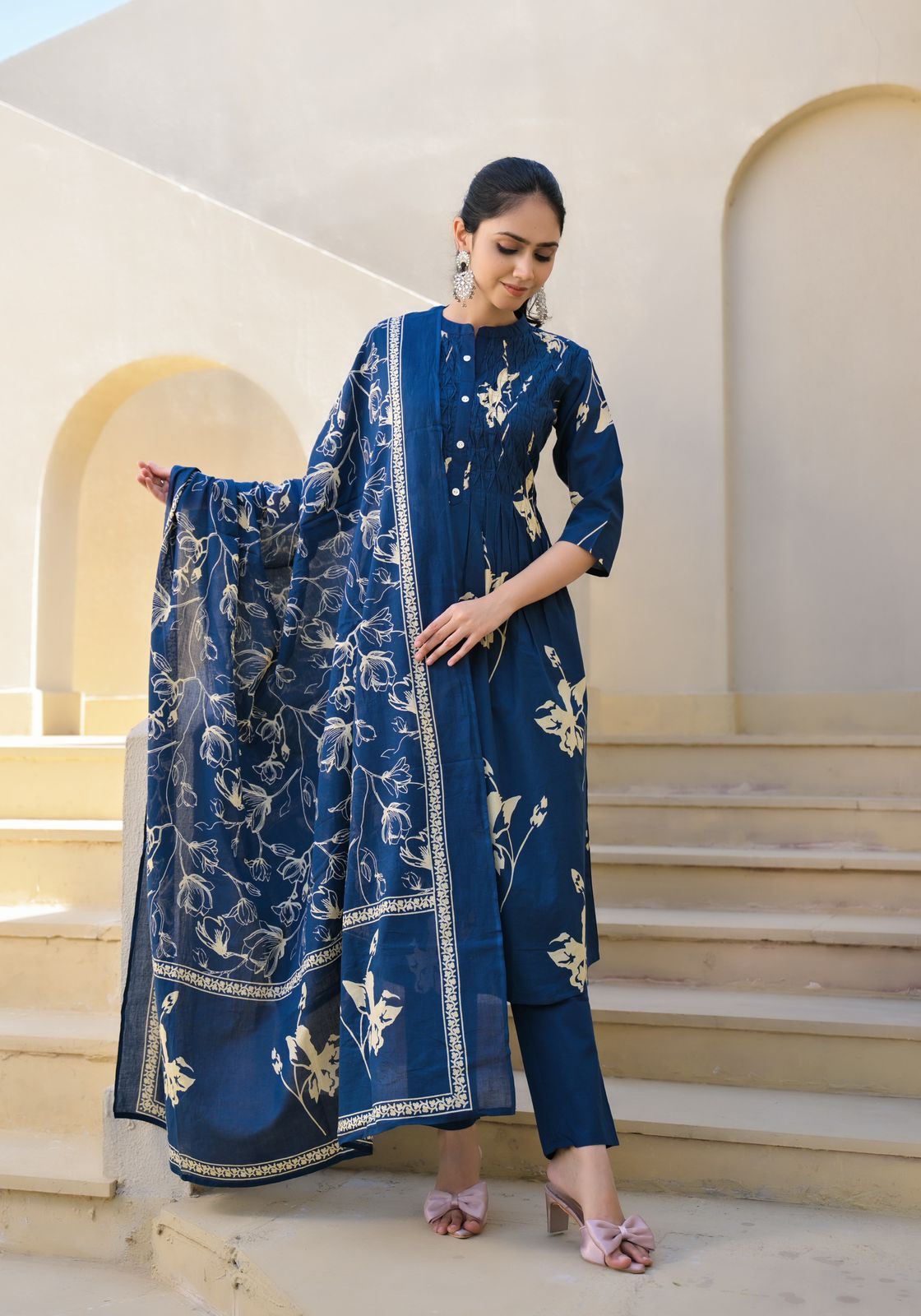 Women wearing cotton navy blue A-line kurta set with dupatta