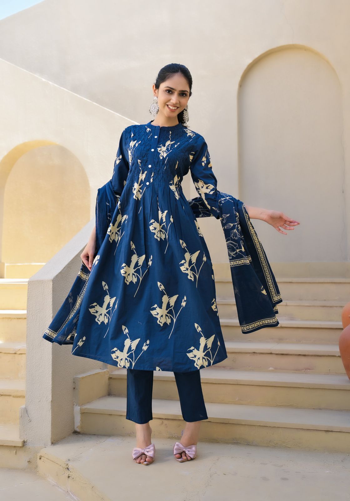 Women wearing cotton navy blue A-line kurta set with dupatta