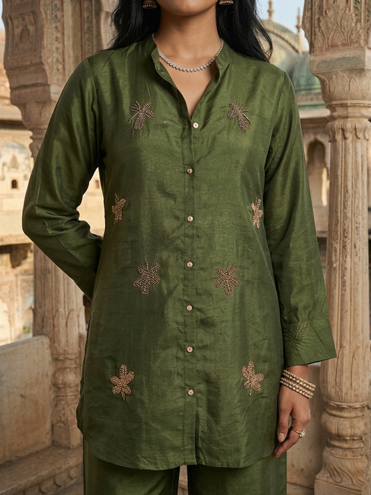 Women wearing Russian Silk Green co-ord set with golden leaf embroidery