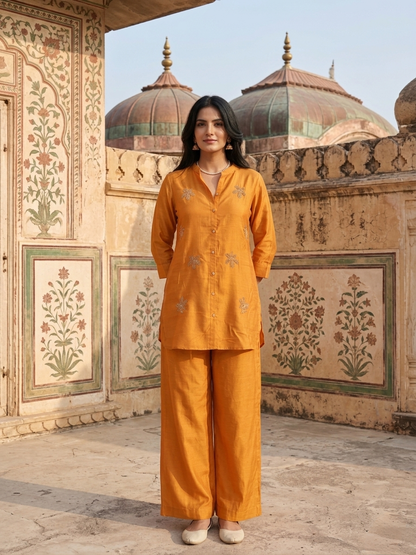 Women wearing Russian Silk Mustard co-ord set with golden leaf embroidery