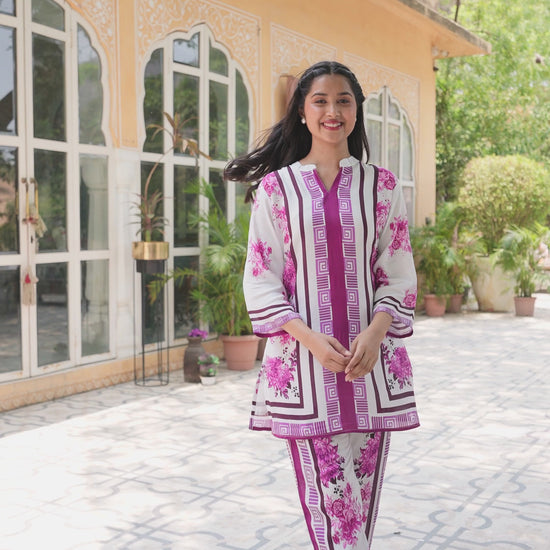 Women wearing pink muslin coord set.