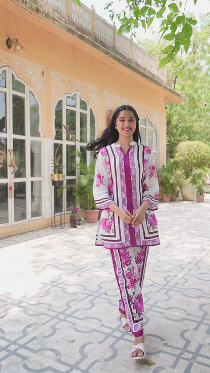 Women wearing pink muslin coord set.