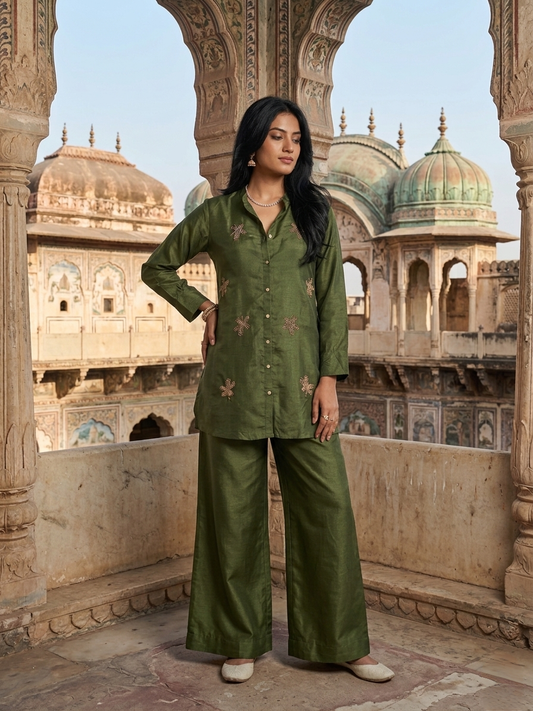 Women wearing Russian Silk Green co-ord set with golden leaf embroidery