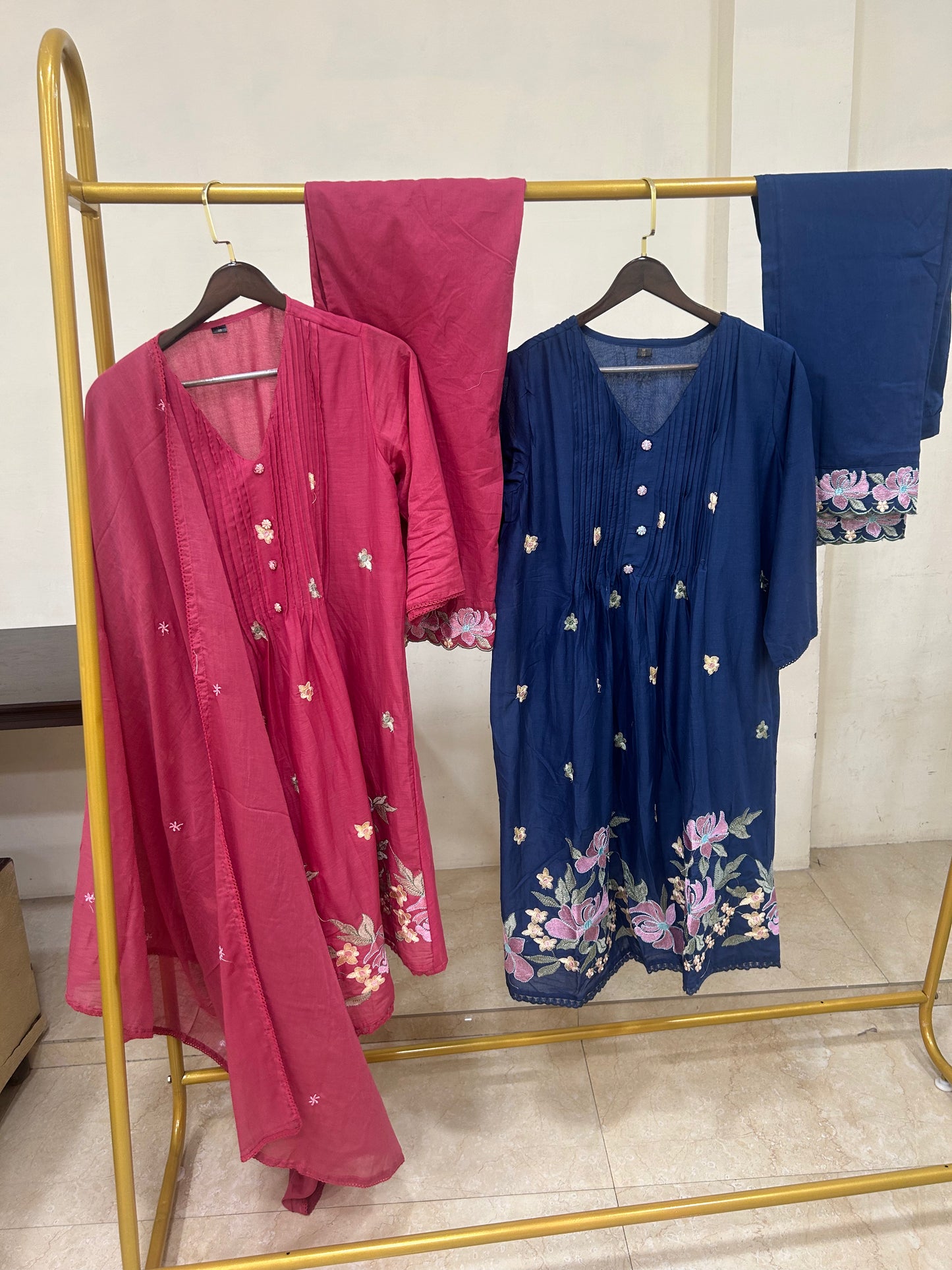 Floral embroidered kurta set with pants and dupatta in mustard, pink and navy blue